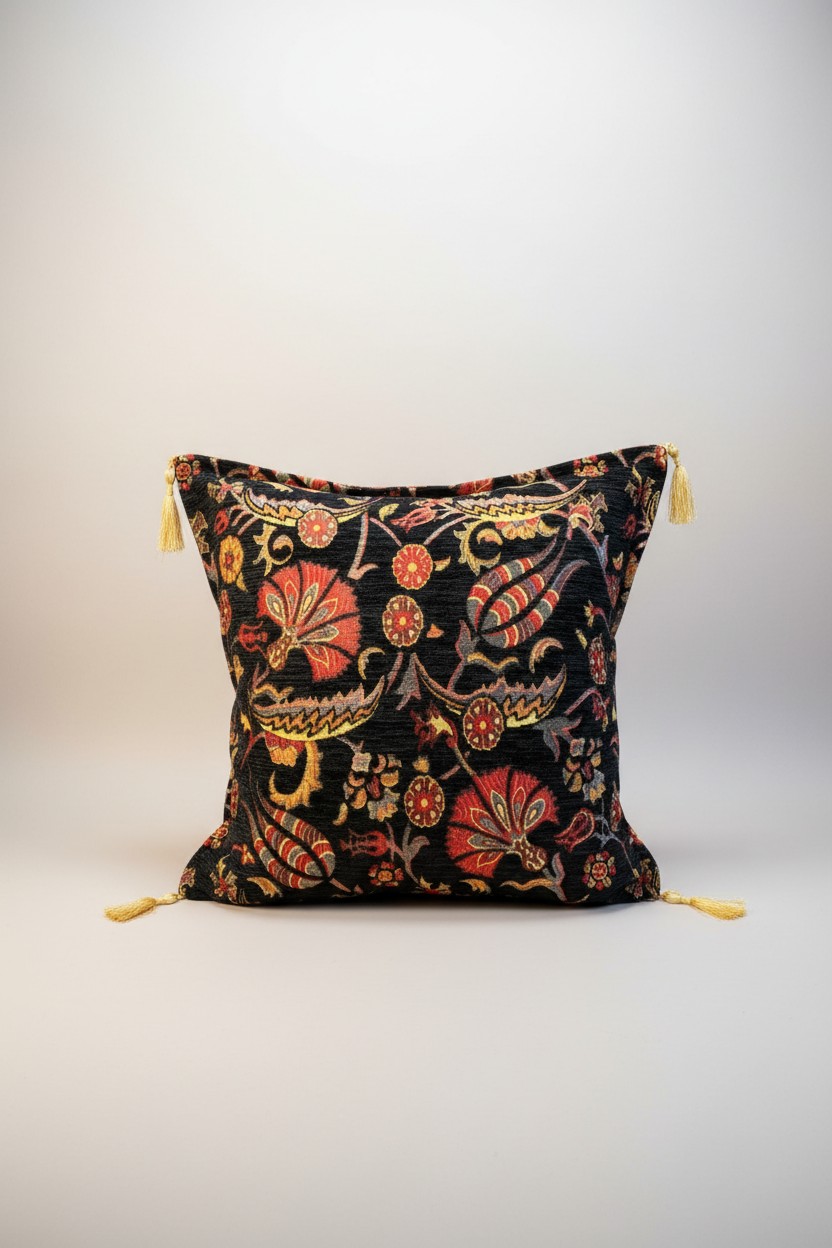 Turkish cushion cover with black ground and red, gold and grey floral embroidery, gold tassels