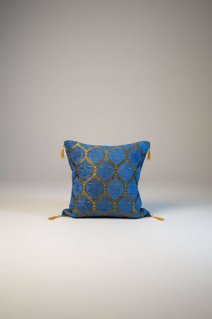 Turkish cushion cover with cobalt blue ground and gold trellis pattern, gold tassels